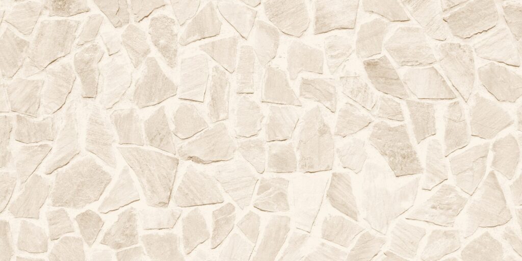 Texture de pierre naturelle beige posée en opus incertum à Pau